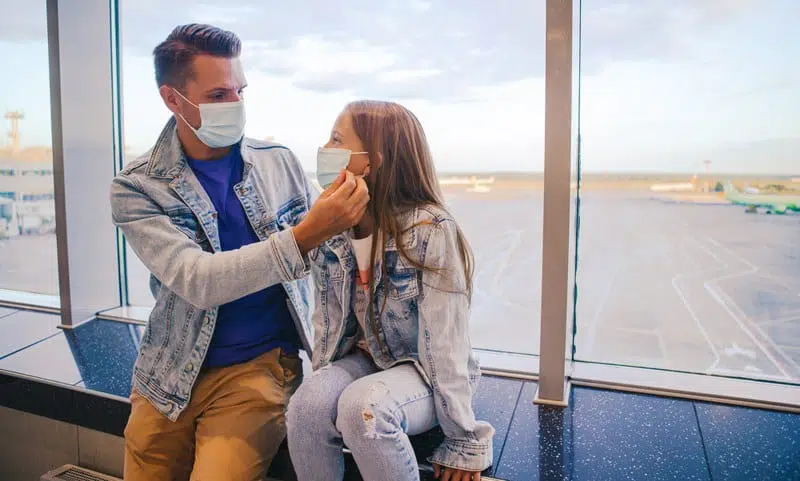 Father & child wear facemask during coronavirus