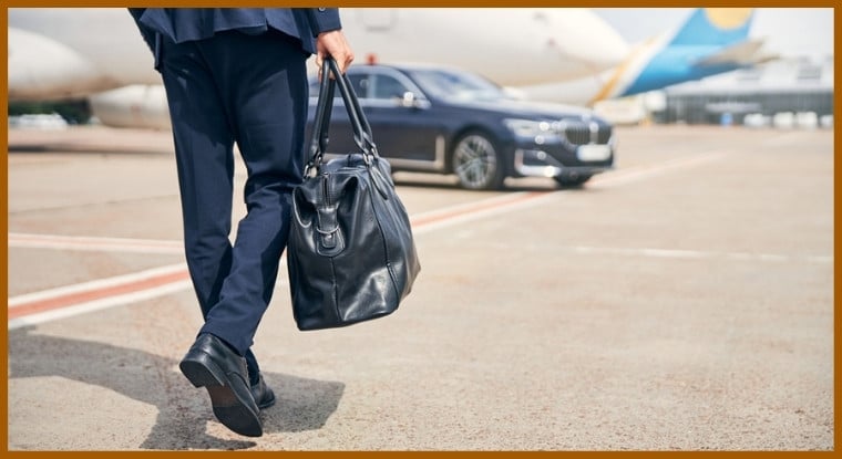 A traveler with a duffel bag going on an air trip